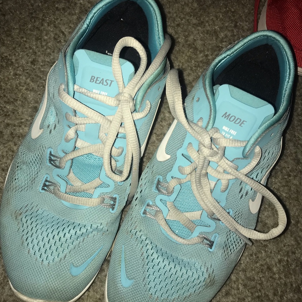 Blue and gray Nike 5.0 free runs